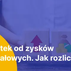 Dwa klocki symbolizują wzrost i pieniądze, nawiązując do tematu podatek od zysków kapitałowych. Jak rozliczyć?